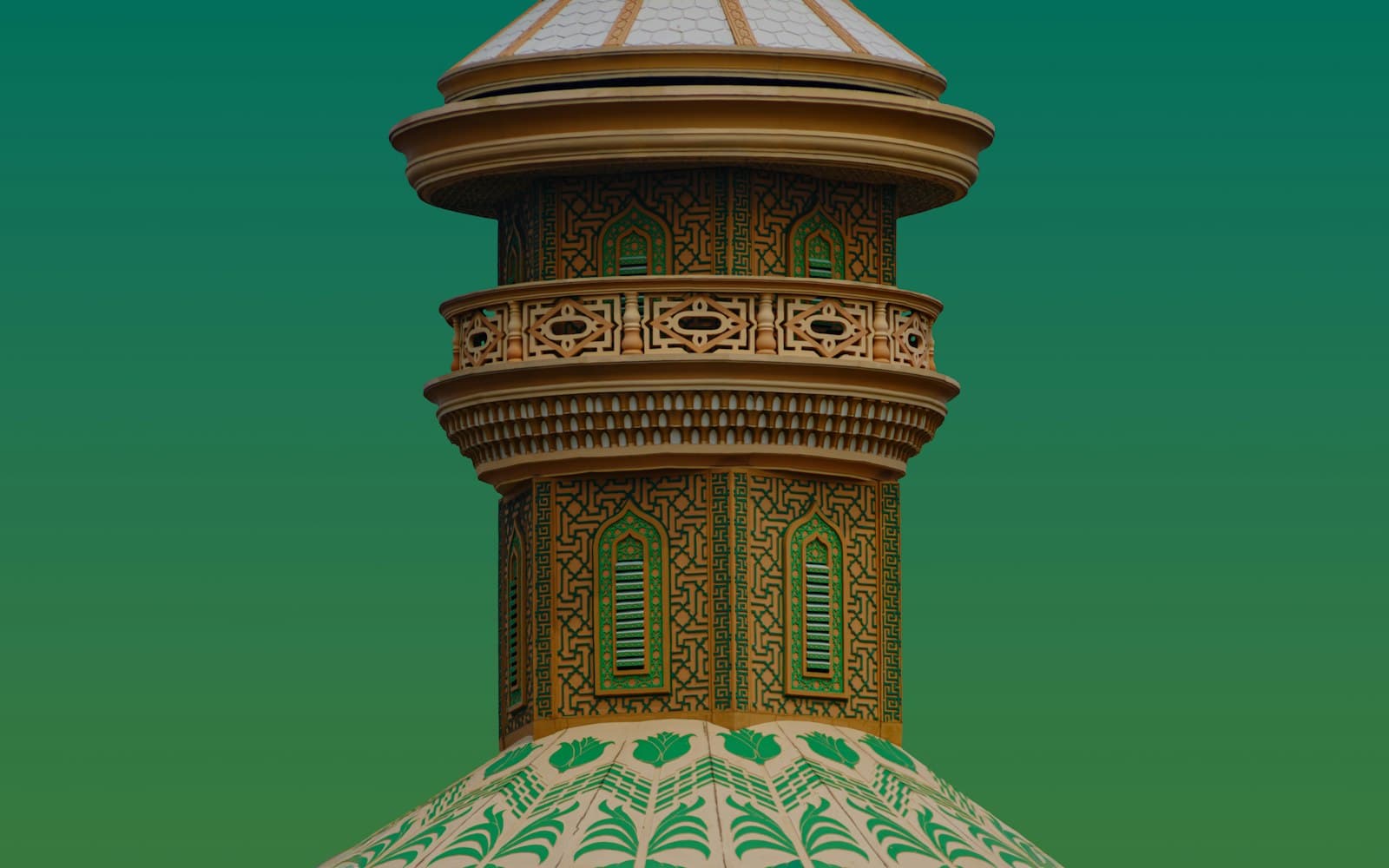A tall building with a white and green roof